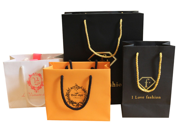 Wholesale high grade hot factory cheap printed paper carrier bags